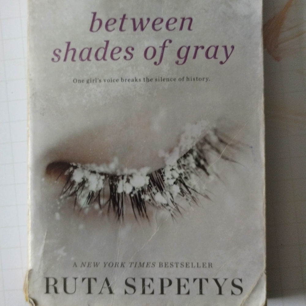 Between shades of gray.